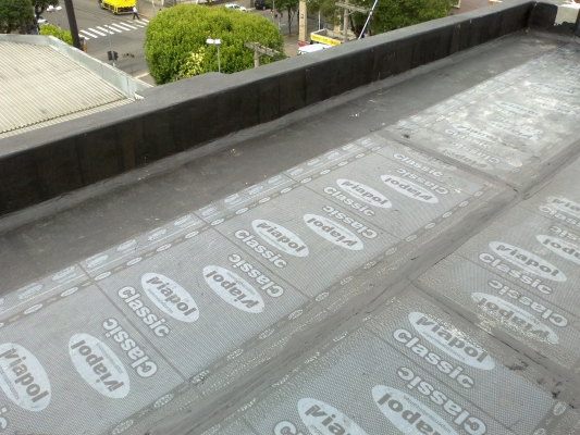 TRANSFORMAÇÃO DO ANTIGO MOINHO PROGRESSO EM EDIFÍCIO COMERCIAL PARA LOCAÇÃO - (5 PAVIMENTOS) - SÃO PELEGRINO - RETIRADOS OS TELHADOS E EXECUTADAS LAJES PRÉ MOLDADAS PROTENDIDAS PARA CRIAÇÃO DE TERRAÇOS